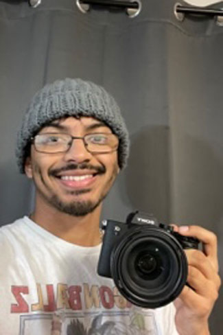 Gio smiling at camera - mirror selfie