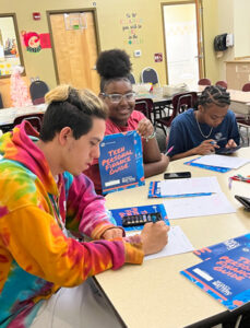 Jill working on the Money Matters program