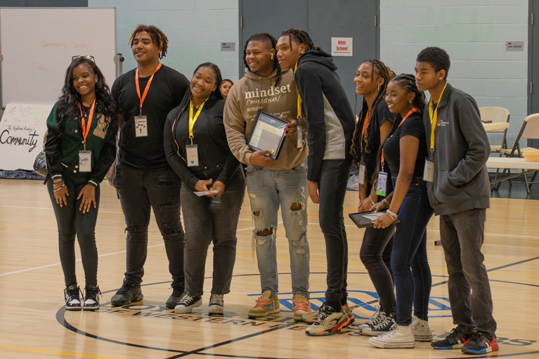 Group of Club teens in gym receiving recognition