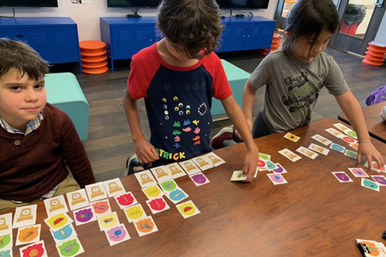 Club kids reading their books