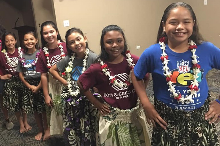 Group of Club girls prepping for hula