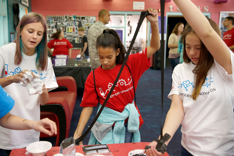 3 girls making slime
