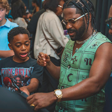 Langston shares his designs with Detroit rapper Big Sean.