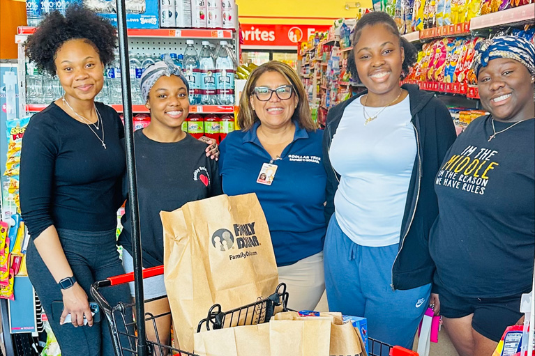 Family Dollar associates with Club kids at store