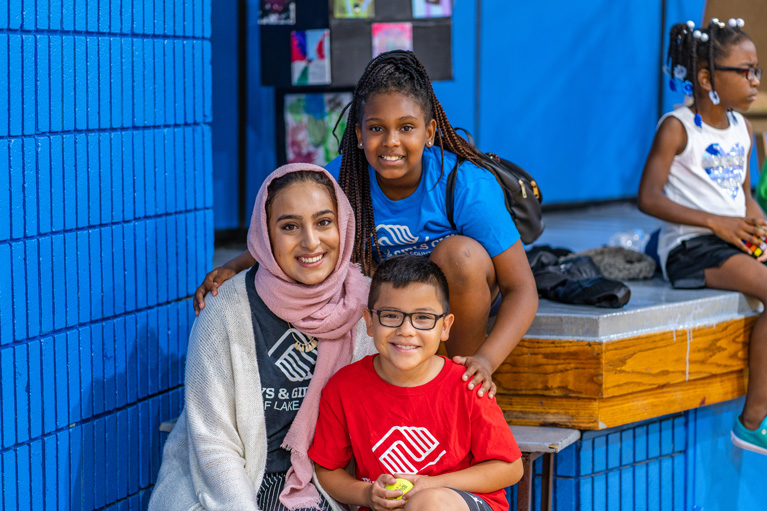 Club YDP and Club kids smiling at the camera