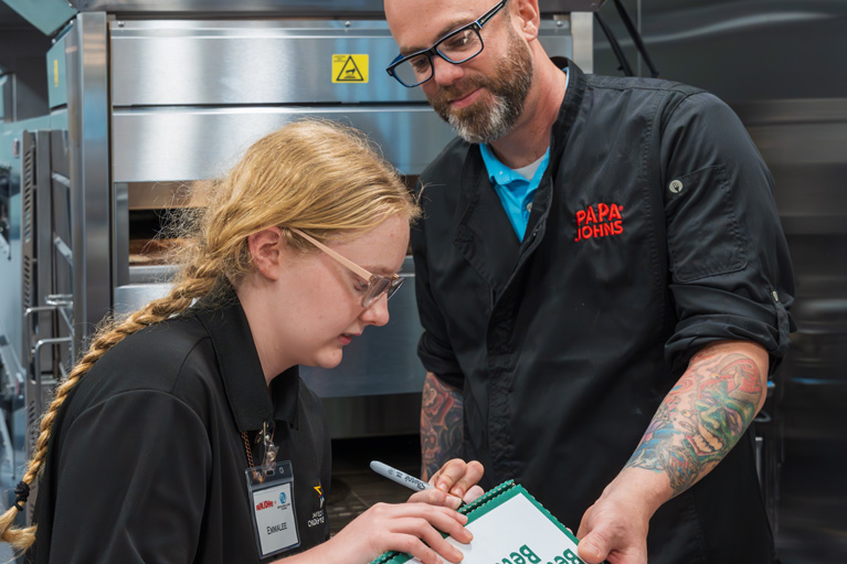 Club teen at Papa Johns Franchisee for a Day event
