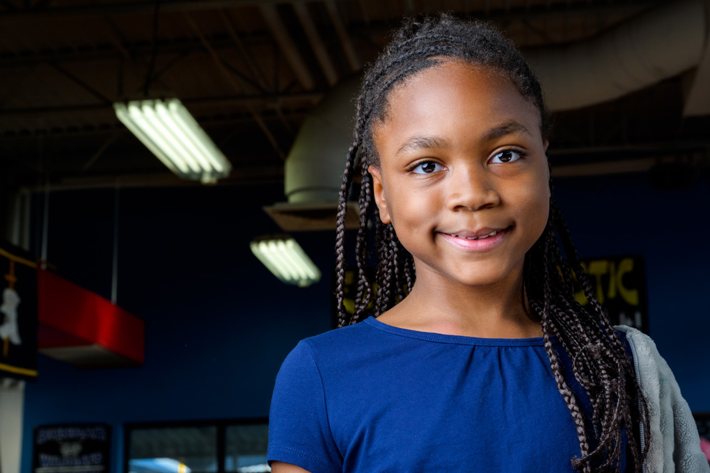 Club kid smiling at camera
