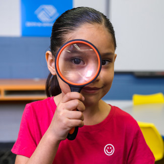 Club girl with magnifying glass