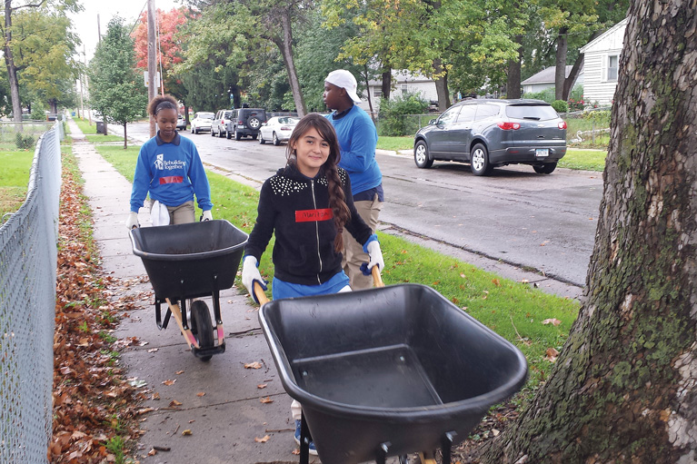Club youth service volunteering for Rebuilding Together
