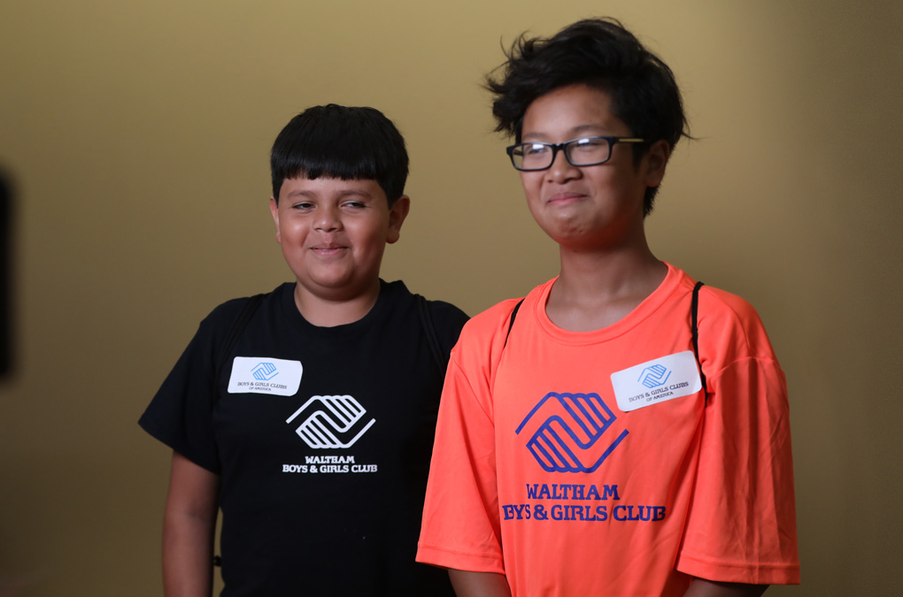 2 grinning Club kids