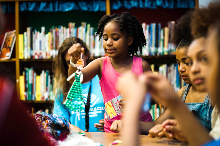 Group of Club kids creating bead art