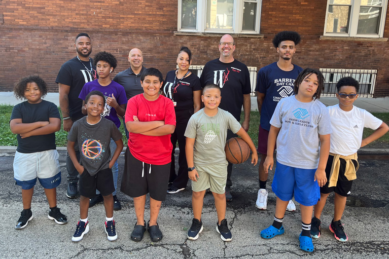 Family Dollar associates volunteering with Club kids