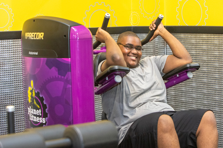 Club teen working out at Planet Fitness