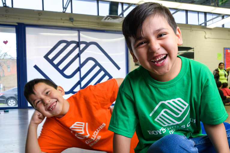 2 Club kids smiling at the camera