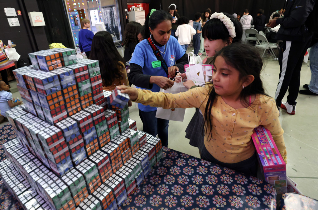 Club kids picking up Rubik's Cubes