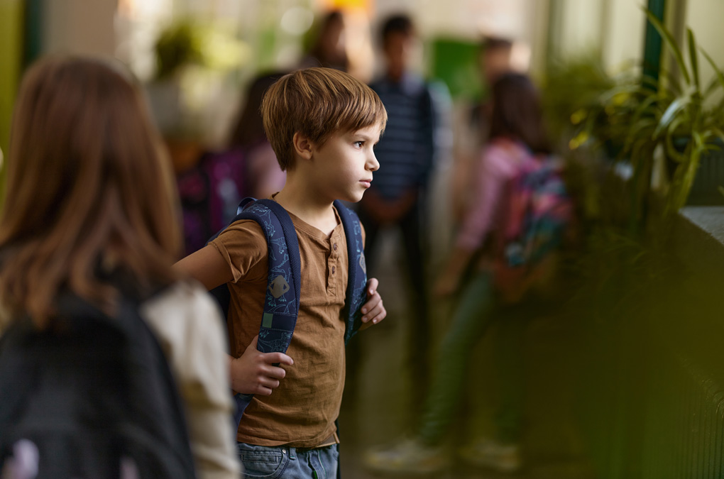 Concerned looking elementary school kid