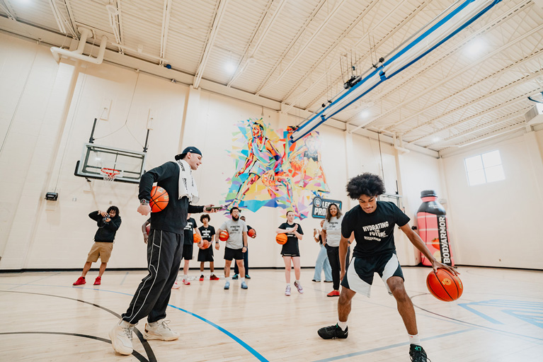 Club kids playing basketball