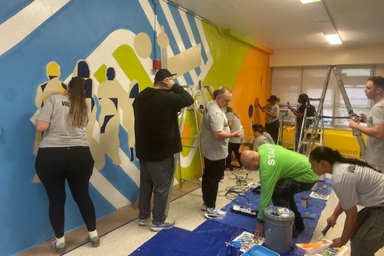 Volunteers painting