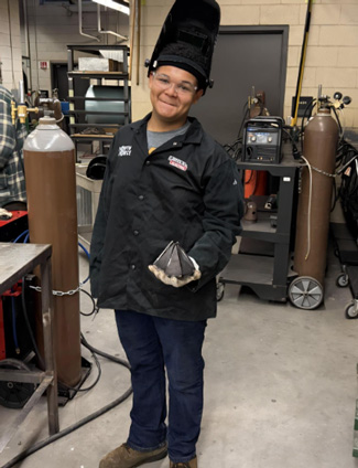 Chris in welding class