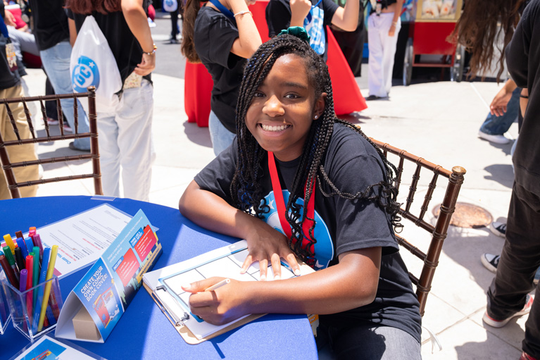 DC Superpowered Storytellers - Club kid smiling at camera