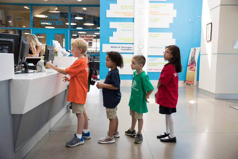 Club kids standing in line