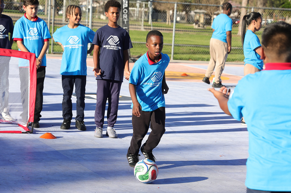 Club kids practicing soccer