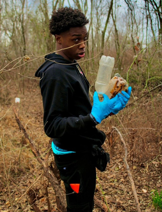 Jonathan picking up trash