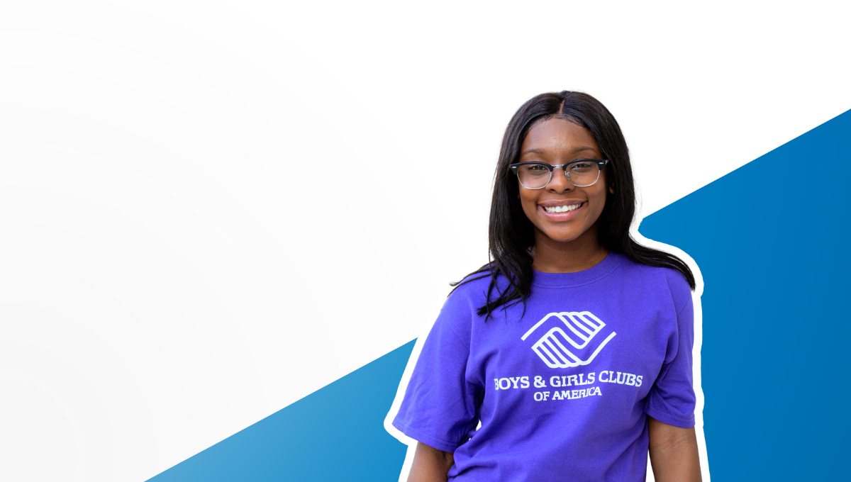 Smiling girl in purple shirt